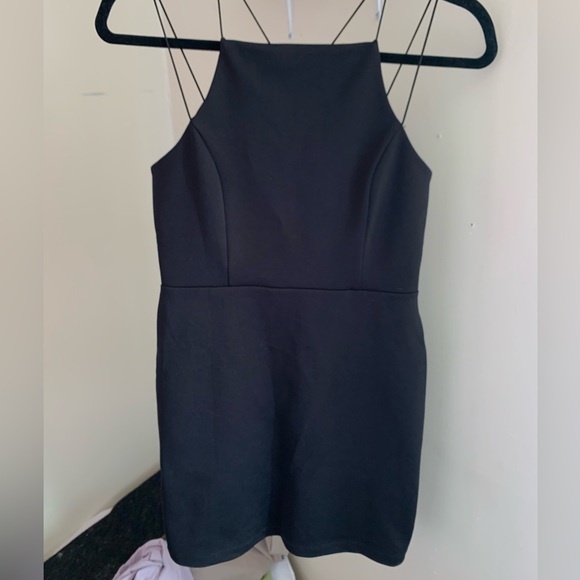 Black mini dress with cross straps - Picture 1 of 3